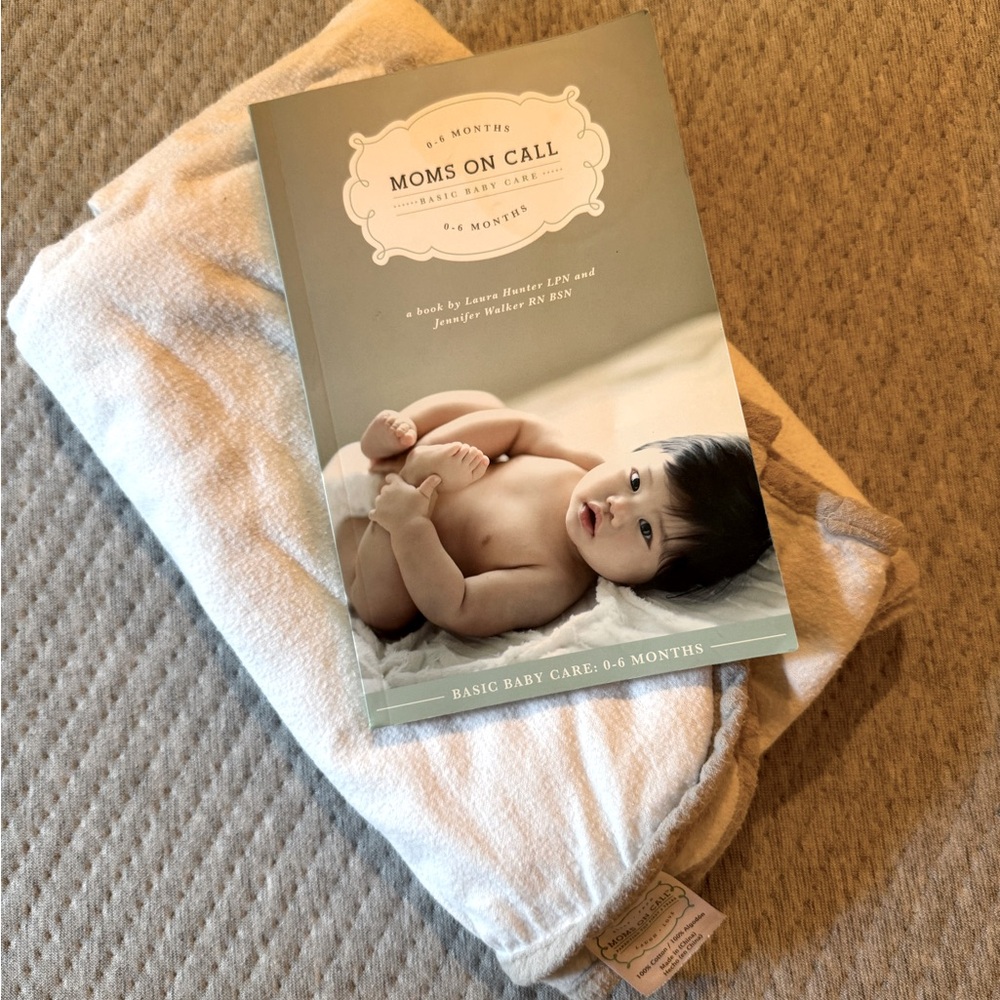 Mom’s On Call 0-6 months book with official swaddle blanket